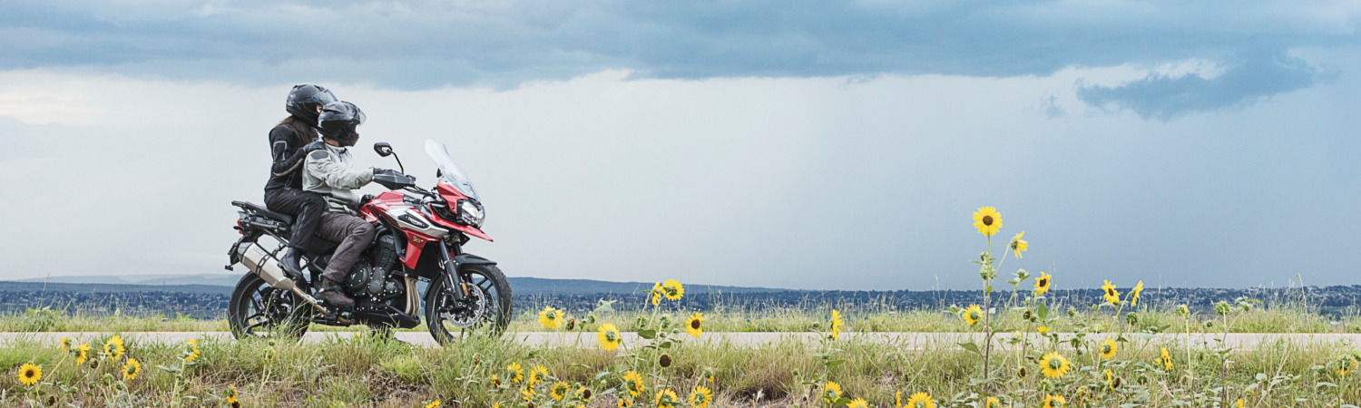 Two riders riding a bike in Rancho, Nevada